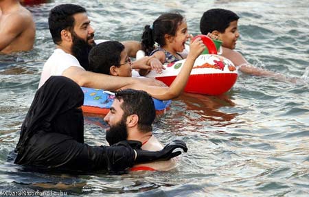 Click image for larger version

Name:	muslim_swimming.jpg
Views:	192
Size:	30.1 KB
ID:	245422